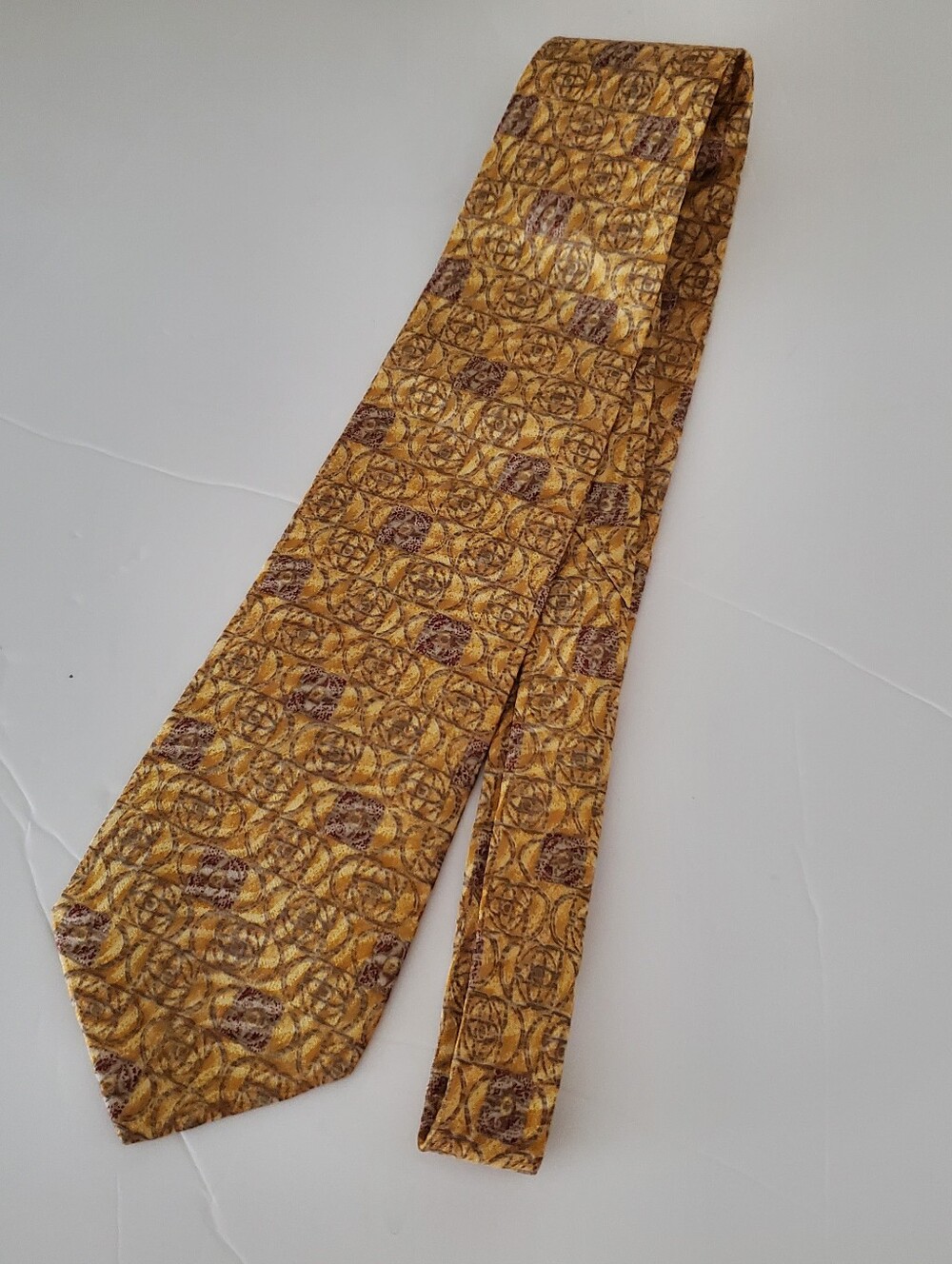 Men's 100% Silk Neck Tie from The MMA Buttery Gold with Mauve Geo Pattern